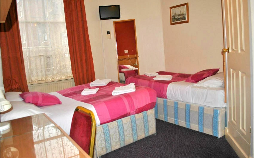 Quad room at Guilford Hotel